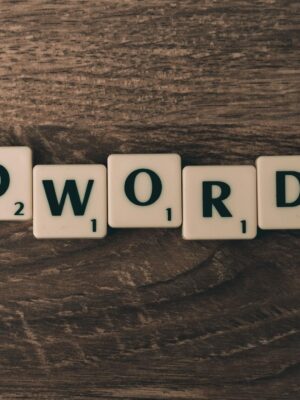 Scrabble Forming Adwords on Brown Wooden Surface