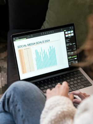 Viewing Social Media Goals Chart on Laptop